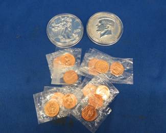 Lot 148. 15 tokens each featuring a U.S. president and two 10 oz. 3 1/2" dia. medallions, composition unknown