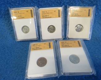 Lot 79. One 1909 P and four 1943 silver wartime SGS certified encased Lincoln Pennies