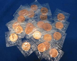 Lot 145. 25 tokens each featuring a U.S. president