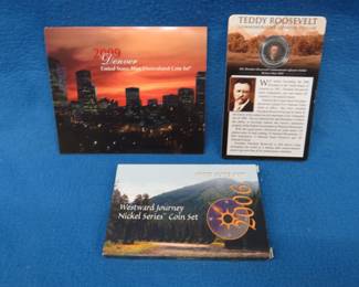 Lot 139. Three collectible coin sets