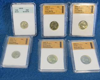 Lot 81. Four SGS certified encased Jefferson wartime nickels, one 1914 Barber Dime, and one 1940 Mercury Dime