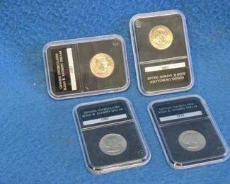 Lot 63. Four Susan B. Anthony slabbed dollar coins 1979, 1980, 1981, and 1999.
