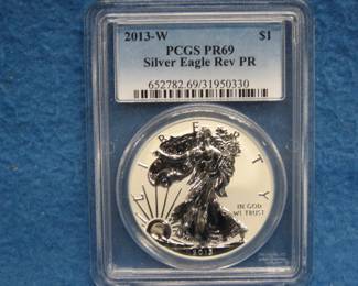 Lot 29. 2013 Silver Eagle graded Rev PR 69 by PCGS
