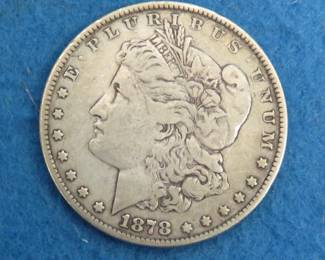 Lot 24. 1878 7-Tail feathers Morgan Silver Dollar graded Fine {#}2 by Littleton Coin Co.