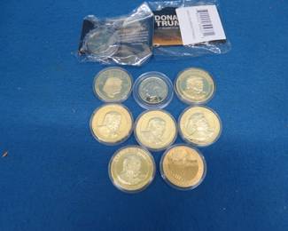 Lot 99. Ten non-monetary gold-colored medallions