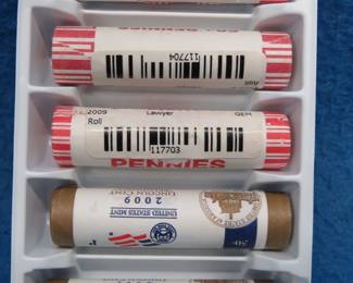 Lot 250. 2009 P and 2009 D mint-rolled Presidency pennies. 2009 P and two 2009 D rolls of Lawyer pennies.