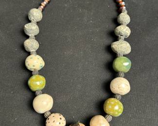 Eclectic Necklace Featuring Beads Stones In Unique Patterns