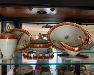 24kt gold Czechoslovakian fine bone china in rare red color. Hand painted edging and details. 85+ years old.