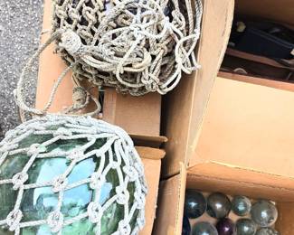 Antique Japanese colored blown glass fishing floats, from about 13" to smaller,  some signed. 