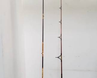 Lot # : 552 - Pair of Utica and Daiwa fishing rods
