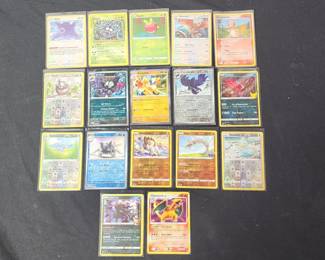 Lot # : 325 - 17 Pokemon cards, foils, Charizard, pb
