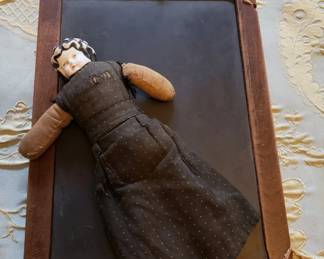 Antique school slate and childs doll with porcelain head