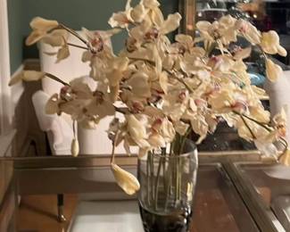 Lifelike silk flowers in heavy glass vase