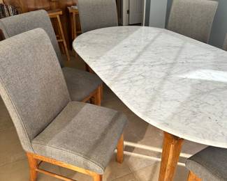 #2- $1,100.00  - Marble dinning table 31H x 79L x 42W with 6 grey fabric chairs 41H x 18W x 19D
