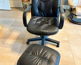 #39 - $60.00  -  Leather office chair with ottoman chair has a little damage 43H x 25W x 20D, ottoman 14H x 20W x 18D