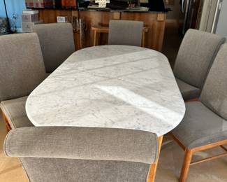 #2- $1,100.00  - Marble dinning table 31H x 79L x 42W with 6 grey fabric chairs 41H x 18W x 19D