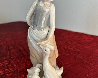 #94 - $34.00  -  Lladro girl with ducks 10 in