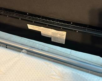 #44 - $100.00  -  Leather Ottoman hide-away rolling bed 16H x 46L x 28W