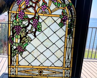 #38 - $90.00  -  Arched top stained glass with grapevines 30 1/2 x 22 1/2