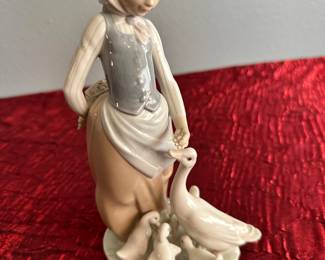 #94 - $34.00  -  Lladro girl with ducks 10 in