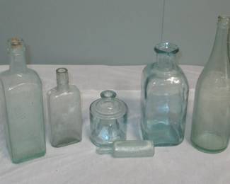 Teal glass antique bottles 