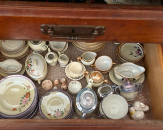 Vintage porcelain handpainted teacups, saucers, plates and serving pieces. 