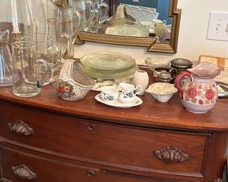 Vintage porcelain pieces, crystal, antique dresser and wall mirror. 