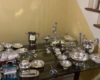 Dozens of Sterling Silver (not plated) serving pieces, candlesicks and decor. 