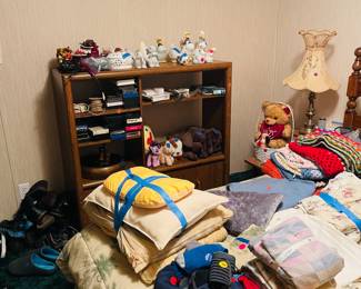 Bed, linens and dog supplies