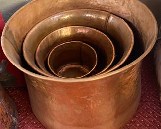Several Graduated Copper Pots