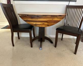 Lot 9 - $300 - Drop Leaf Table and 2 Chairs - 40"w 24"d with leaves down, 2 leaves 8"w each, max 40" x 40" 30"h.  Chairs have 18"h seat.