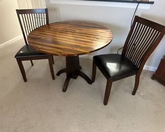 Lot 9 - $300 - Drop Leaf Table and 2 Chairs - 40"w 24"d with leaves down, 2 leaves 8"w each, max 40" x 40" 30"h.  Chairs have 18"h seat.