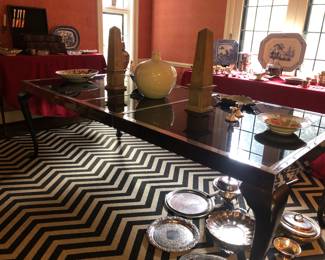 Wonderful custom vintage dining table with steel frame, black wood legs, black glass top and 2 leaves