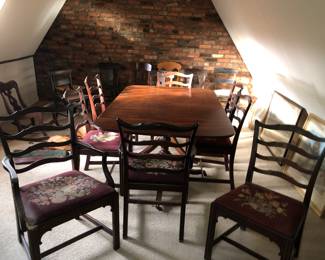 Set of 8 chairs in varying degrees of needing TLC, double pedestal mahogany dining table, with 3 or 4 leaves, in not too bad condition