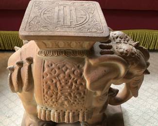 Ceramic cast elephant table