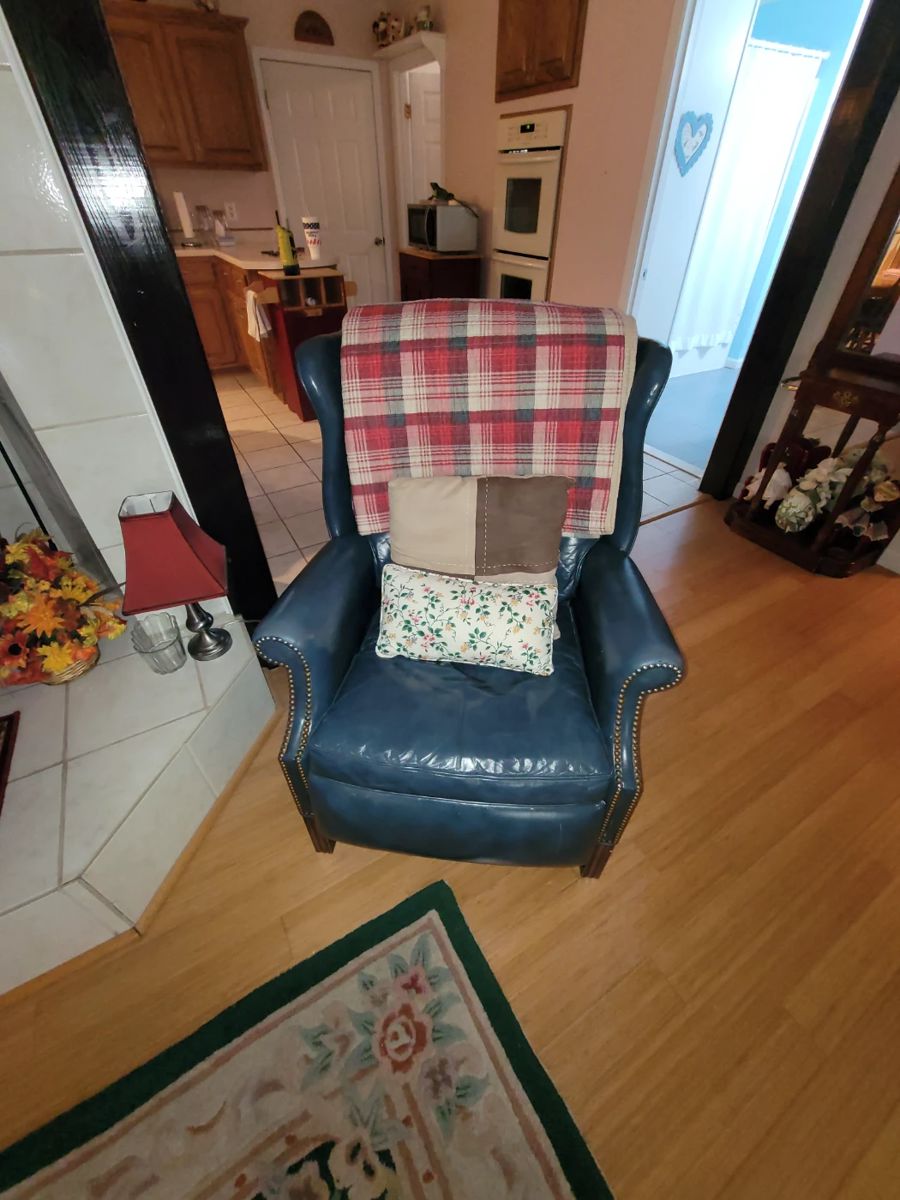 Leather wing back recliner