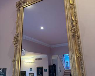 Ornate gold framed mirror