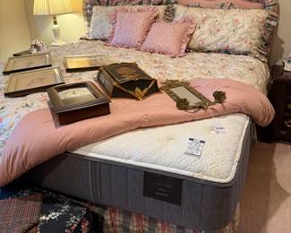 Pink and green plaid headboard,  Stearns & Foster king size mattress
