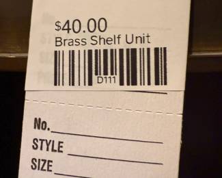   Brass shelf unit

