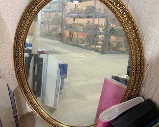 Antique ornate gold framed mirror