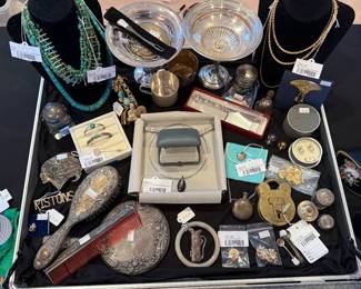 Chanel shield sunglasses (c.127/87), Ed Hardy 024 sunglasses, Tiffany & Co. golf ball paperweight, Gucci Vtg Hot Air Balloon Scarf, 18k Movado pebble necklace and earrings, Tiffany sterling 
