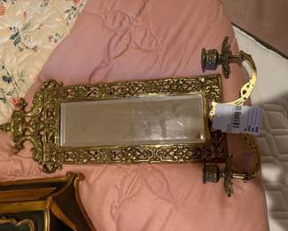 Ornate gold mirrored wall sconce