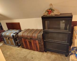 1900s TOOLED METAL AND WOOD HUMP BACK TRUNKS