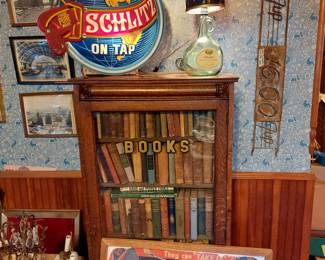 OLD METAL 7UP DOOR PUSH BAR-NICE LIGHTED J&  B ROTATING LIGHT SHADE- WORKS- SCHLITZ SIGN.NEON IS BROKEN- HAS A SMALL LIGHT CORD INSIDE-EARLY 1900s CARBOARD TIRE - SIGN.NICE OAK BOOK CASE WITH ORIGINAL GOLD LETTERS