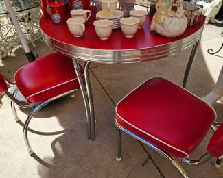 Half Moon size retro diner table with 2 chairs.  Great for small size spaces.