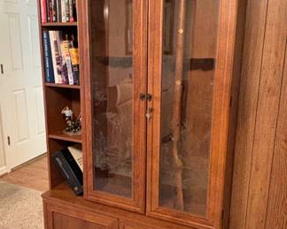 Gun cabinet with etched doors...
