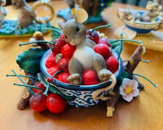 A selection of more than 85 "Charming Tails" figures...