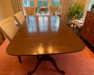 Baker double pedestal vintage mahogany dinning room table with 3 leaves. 64x42 or 86 with leaves. $5000