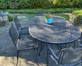 Iron dining table and chairs x 8. $850