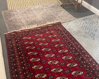 Numerous rugs, including this Moroccan and modern rugs.